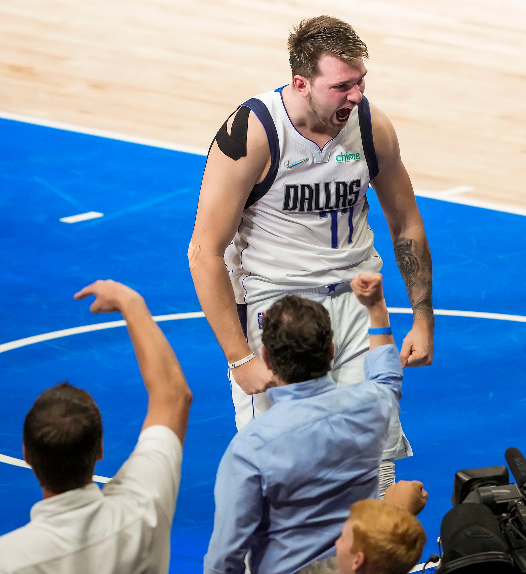 Dallas Mavericks guard Luka Doncic (77) celebrates after a basket and a foul during the...