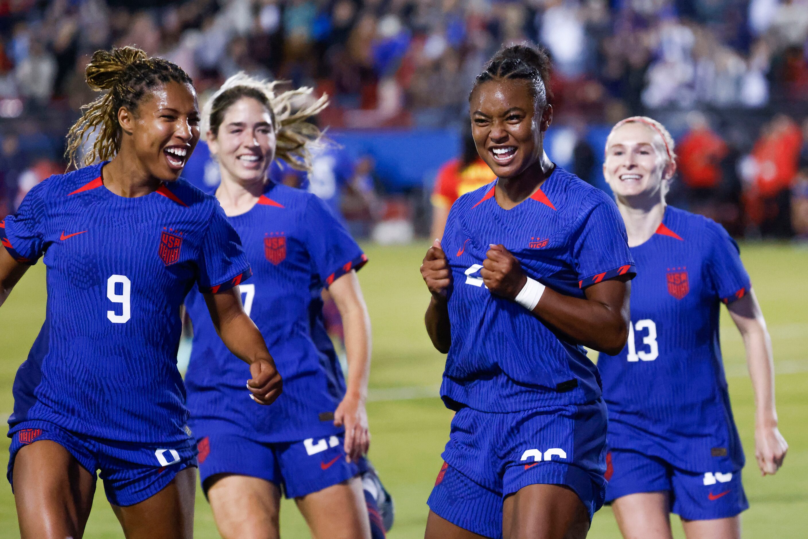 Untied State’s Jaedyn Shaw (center right) celebrates her first international goal during the...