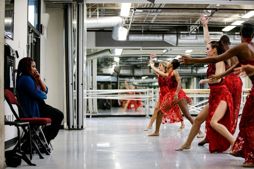 Artistic director Bridget L. Moore (left) watches as her dance company rehearses at Booker...