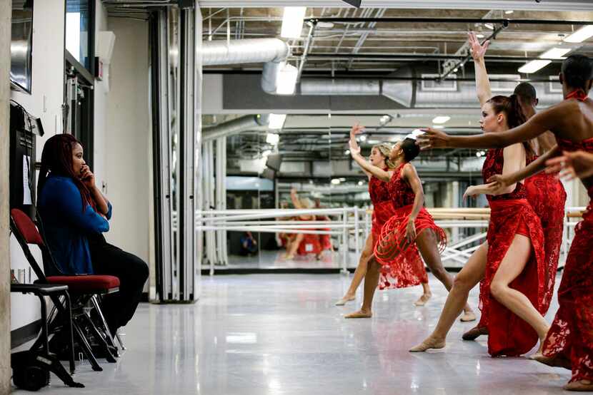 Artistic director Bridget L. Moore (left) watches as her dance company rehearses at Booker...