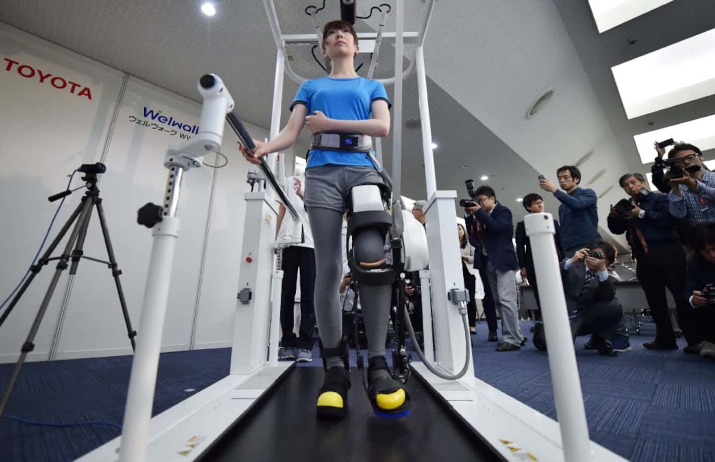 A model demonstrates how the rehabilitation-assist robot Welwalk WW-1000, developed by...