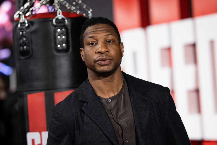 Jonathan Majors poses for photographers upon arrival for the premiere of the film "Creed...