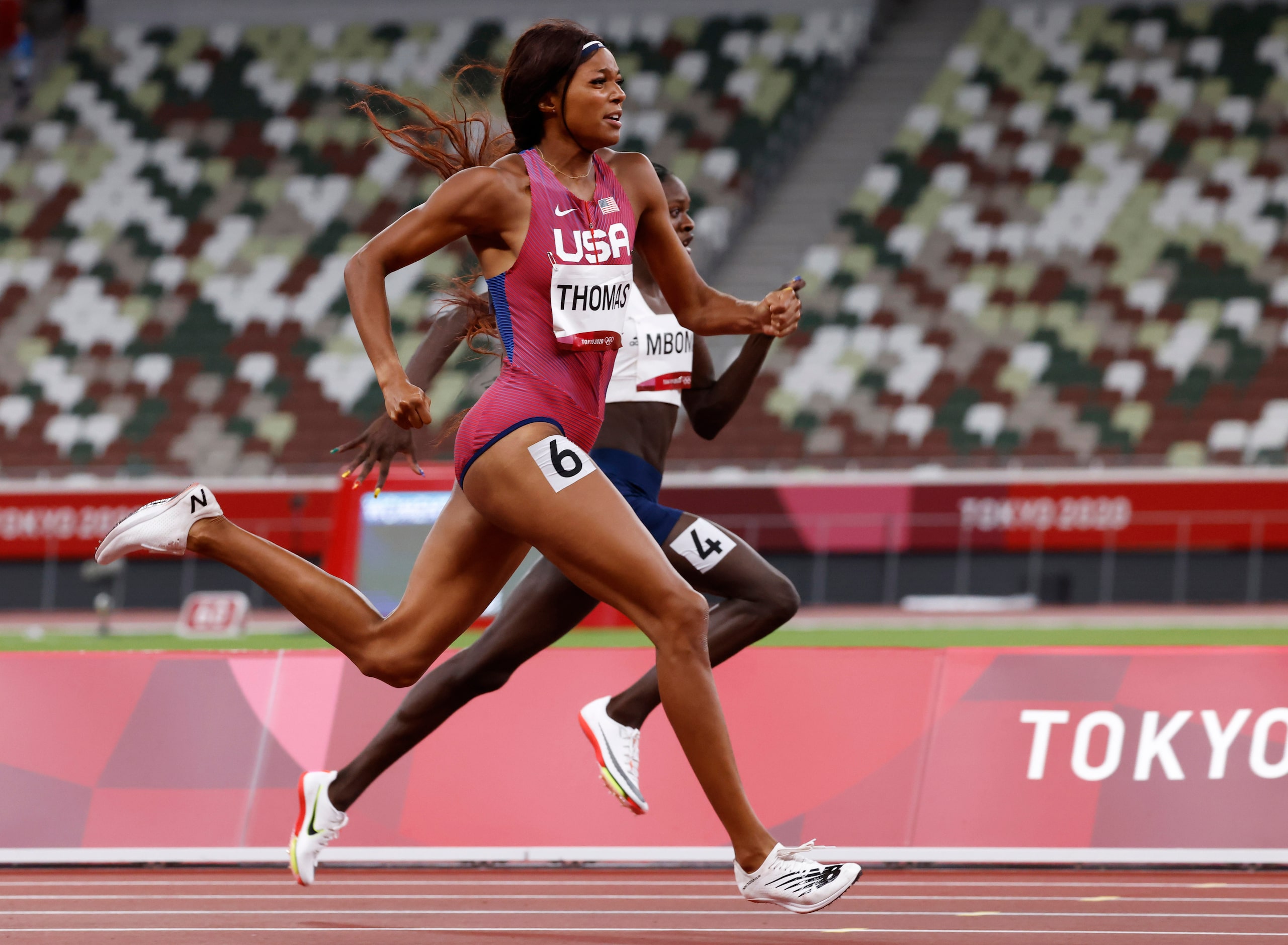 USA’s Gabrielle Thomas competes in the women’s 200 meter semifinal during the postponed 2020...