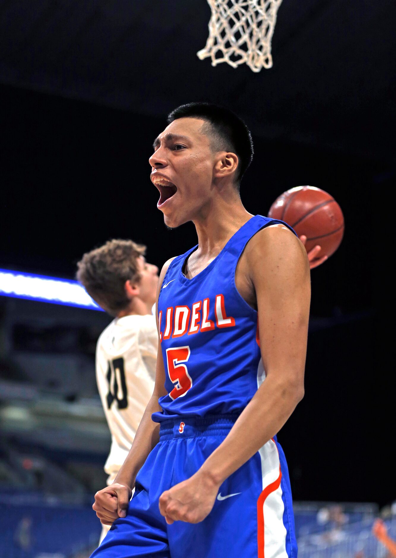 Slidell guard Humberto Hernandez #5 reacts after scoring. Slidell defeated Jayton 45-28 in a...