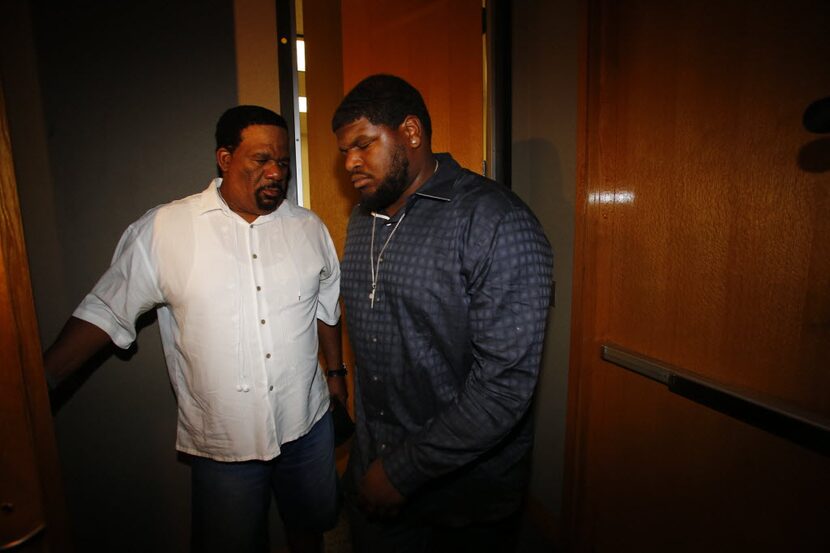 David Wells (left) accompanied Josh Brent for a court hearing in the intoxication...