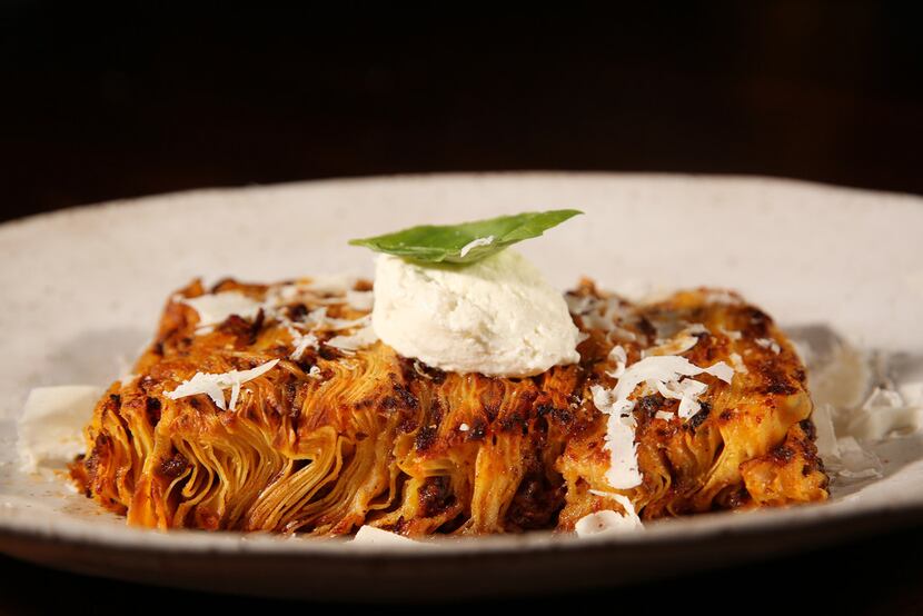 The 100-layer lasagna is served on its side. Cuz dang, it's tall.