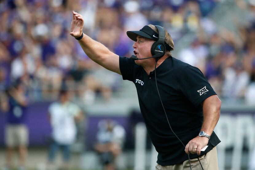 TCU head coach Gary Patterson calls a play against SMU during the first half of an NCAA...
