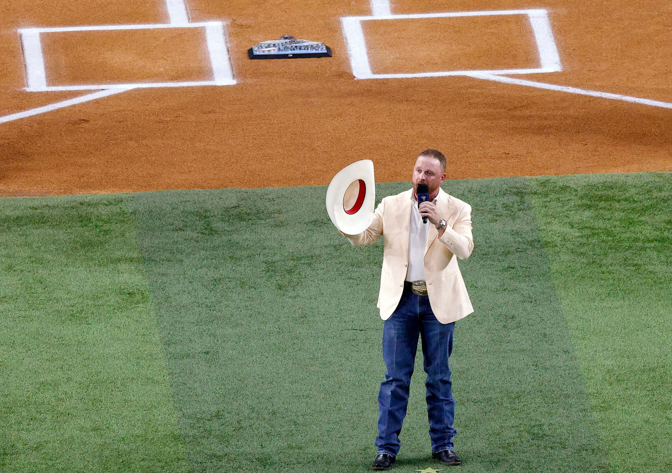 Country music singer Cody Johnson sings the anthem before the MLB All-Star baseball game at...