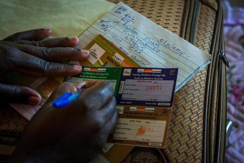 Boda boda drivers are paid with a voucher after delivering a mother to the nearest health...