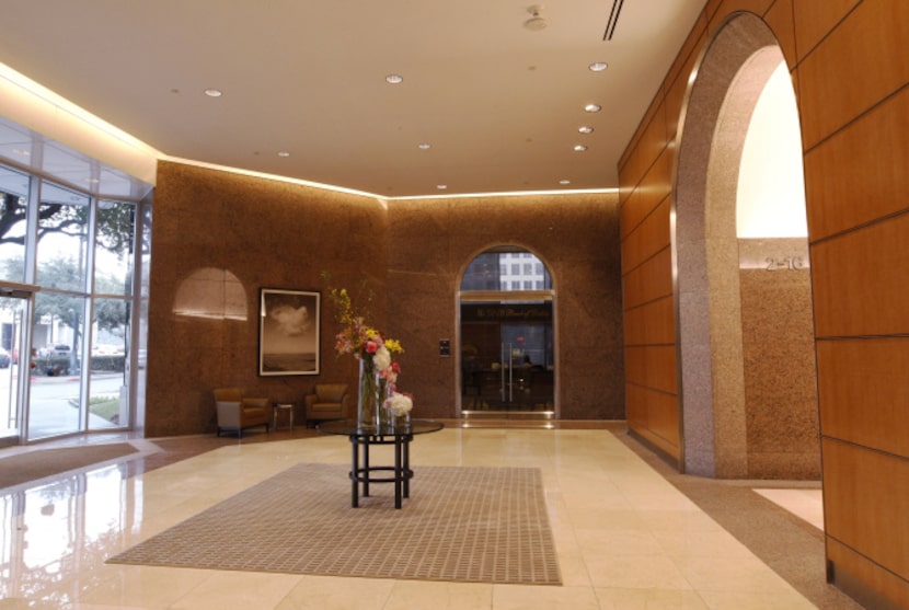 After an eight-month makeover, polished sycamore walls have replaced the dark stone in the...