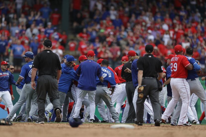 ARLINGTON, TX - MAY 15:  The Toronto Blue Jays and the Texas Rangers clear the bench after...