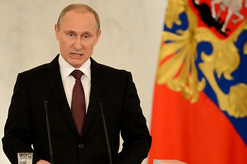 Russia's President Vladimir Putin addresses a joint session of Russian parliament on Crimea...
