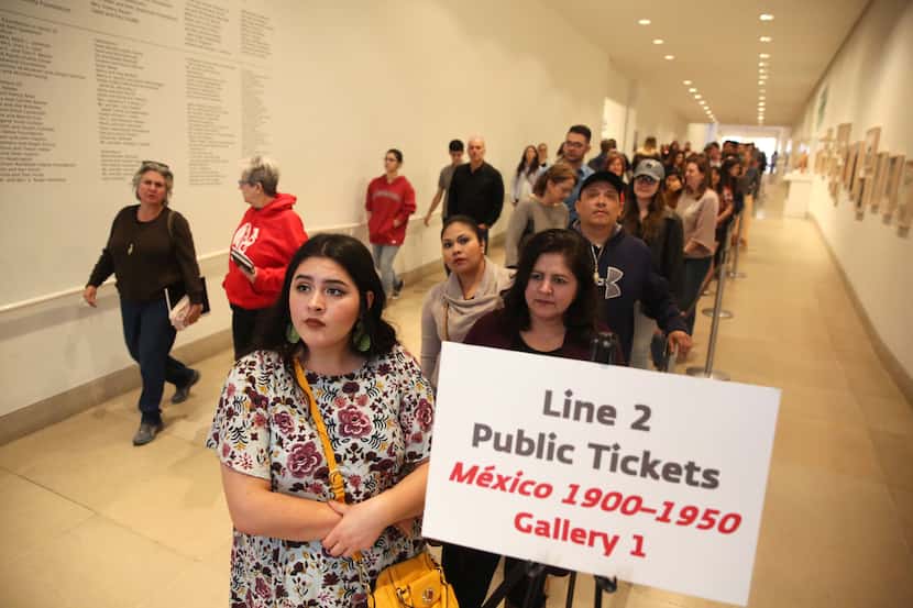 Leslie Marrufozo (front) waits in line for the "Mexico 1900-1950: Diego Rivera, Frida Kahlo,...