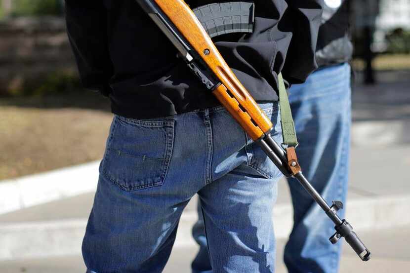 
An open carry demonstrator carried a gun over his shoulder near the Texas Capitol after a...