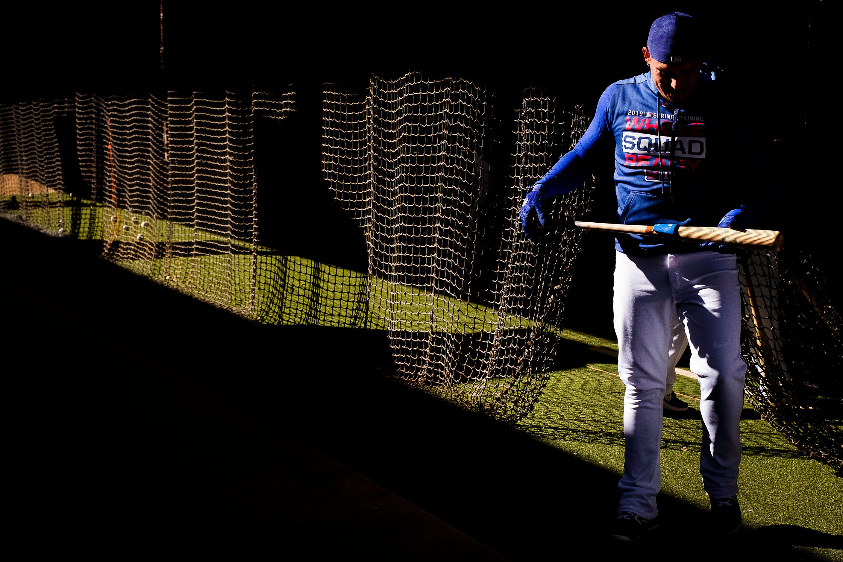 Texas Rangers infielder Asdrubal Cabrera steps out of the indoor batting cage during a...