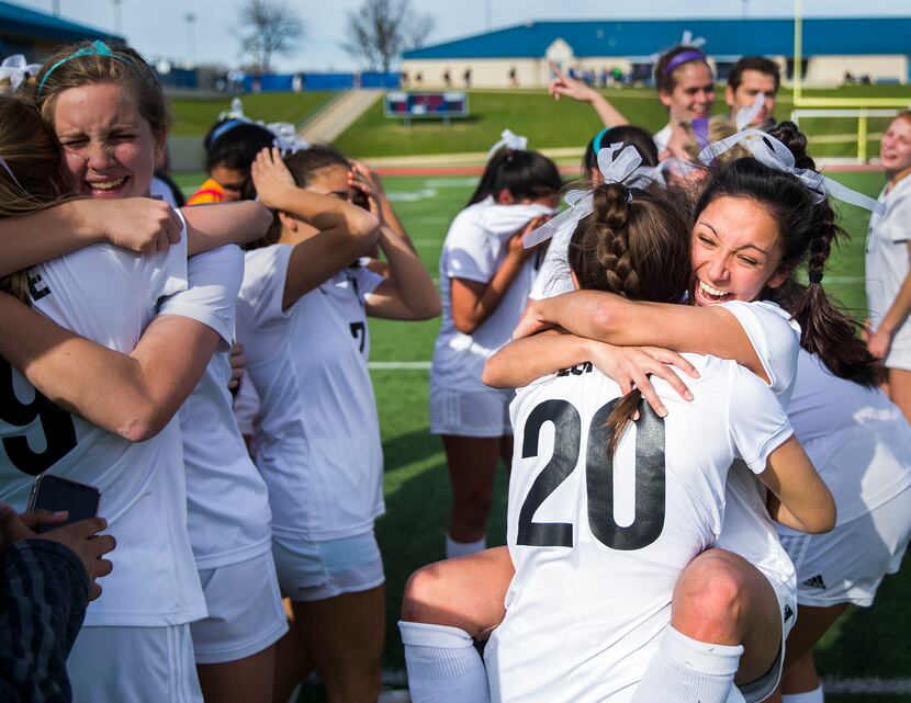 Friar midfield Nevaeh Lopez (20) embraces Friar defense Catherine Cabra (3) after winning...