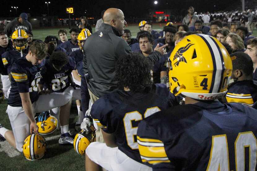 Arlington Lamar head coach Laban DeLay shares words of inspiration and encouragement to his...