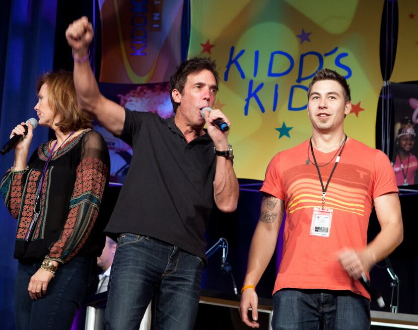 Kellie Rasberry, Kidd Kraddick and Jose "J-Si" Chavez helped host a Kidd's Kid's event in 2012.