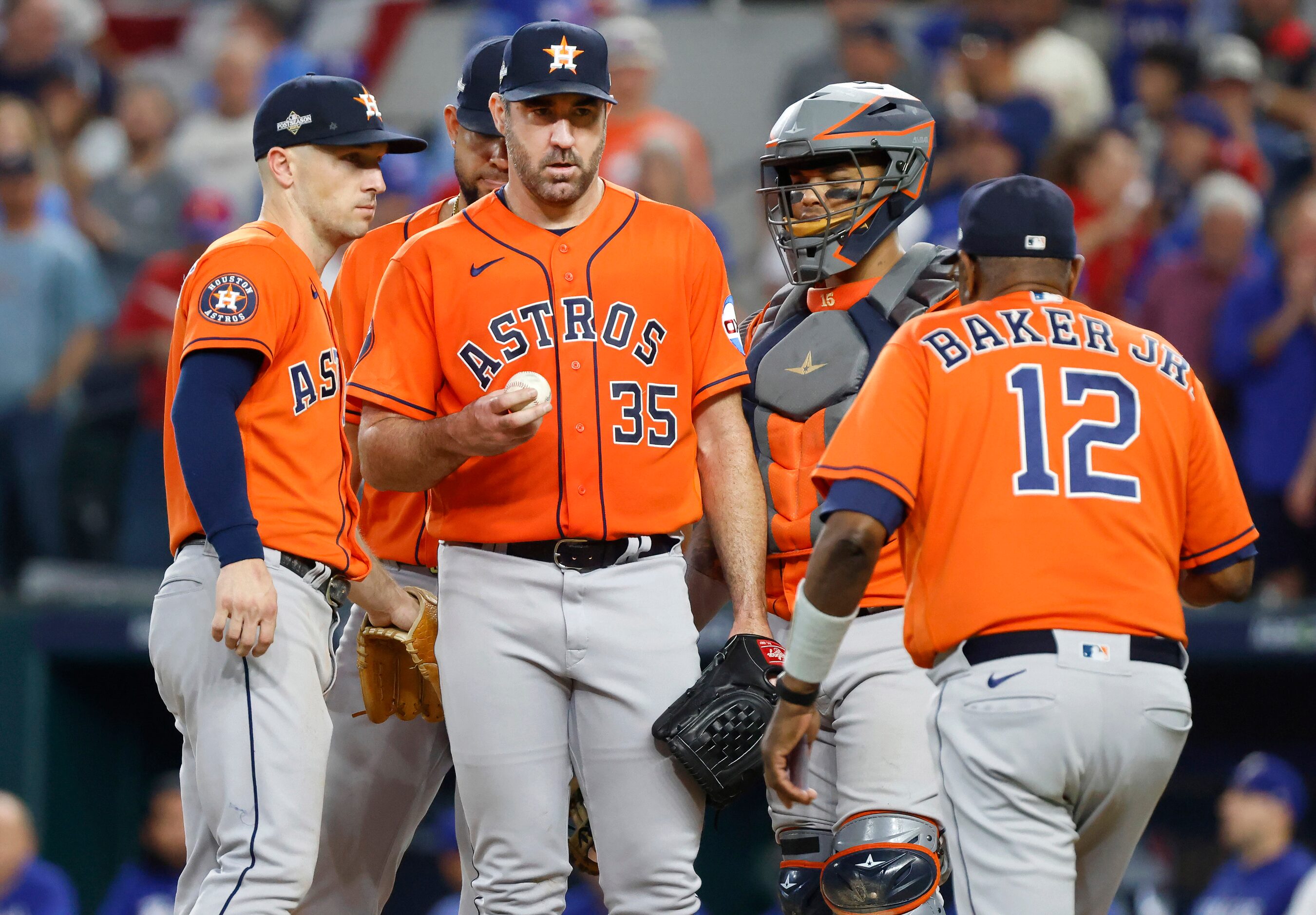 Houston Astros starting pitcher Justin Verlander (35) waits to hand the ball off to manager...