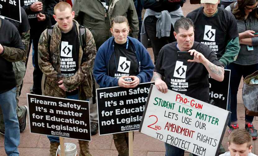 Pro-gun marchers rally for fortified schools and more armed teachers Saturday at the Utah...