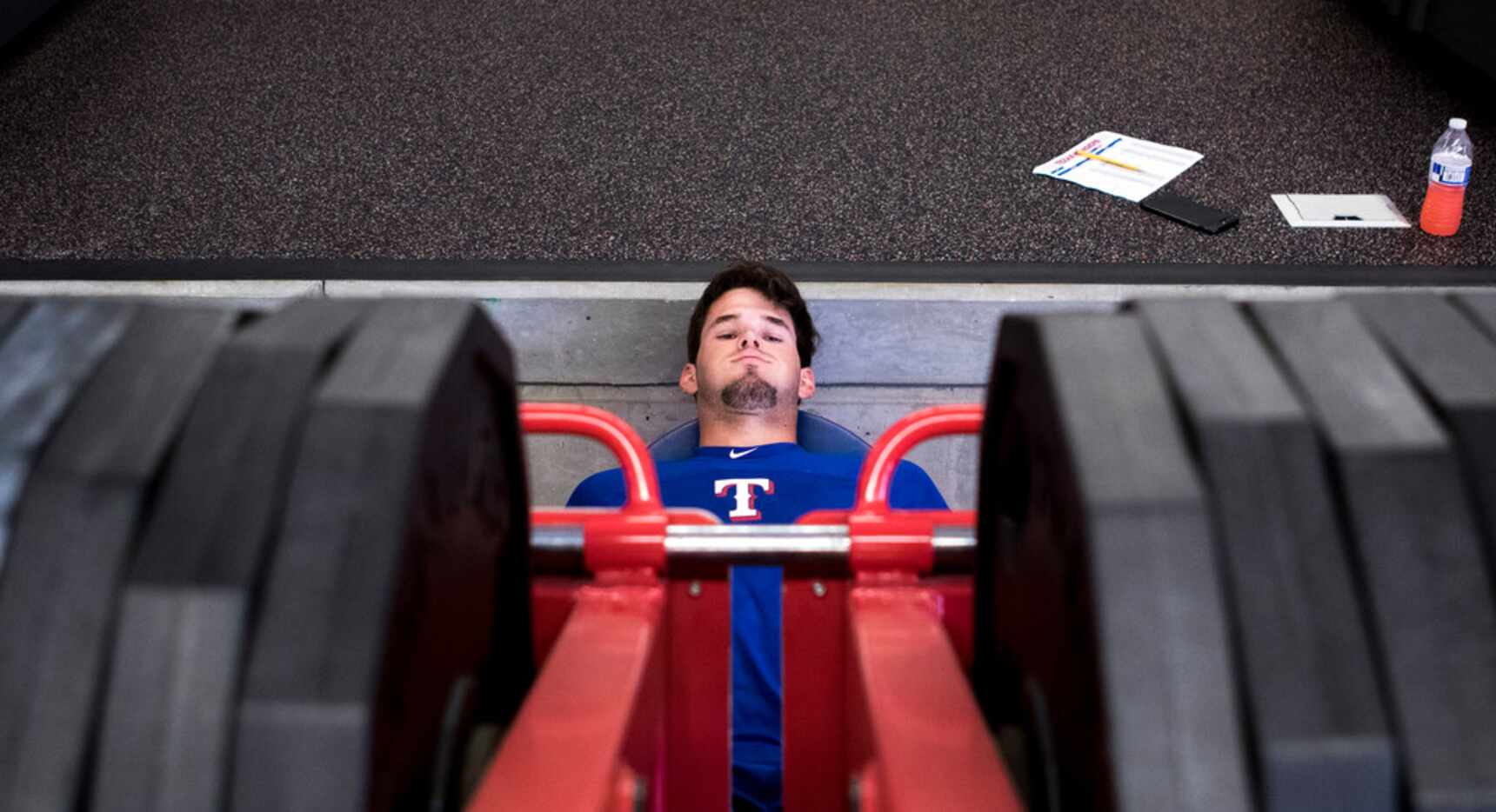 Texas Rangers' pitcher Cole Ragans works his legs at the Rangers' training facility...
