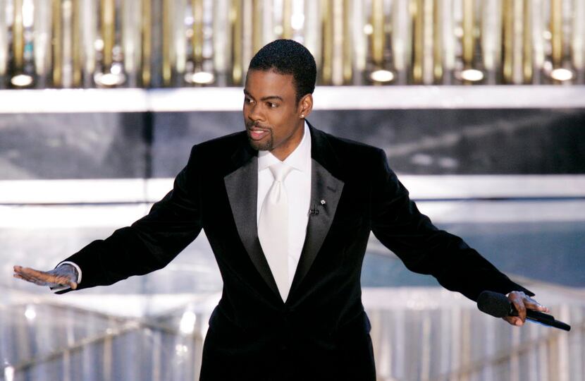 Chris Rock performs his monologue to open the 77th Academy Awards telecast in Los Angeles. 
