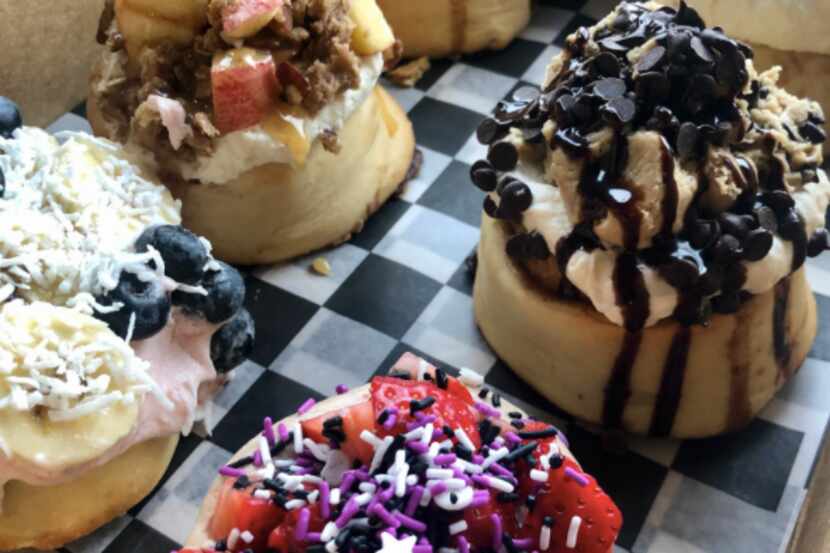 Cinnaholic's signature rolls include the sparkle berry, cookie monster, old skool. tropical...