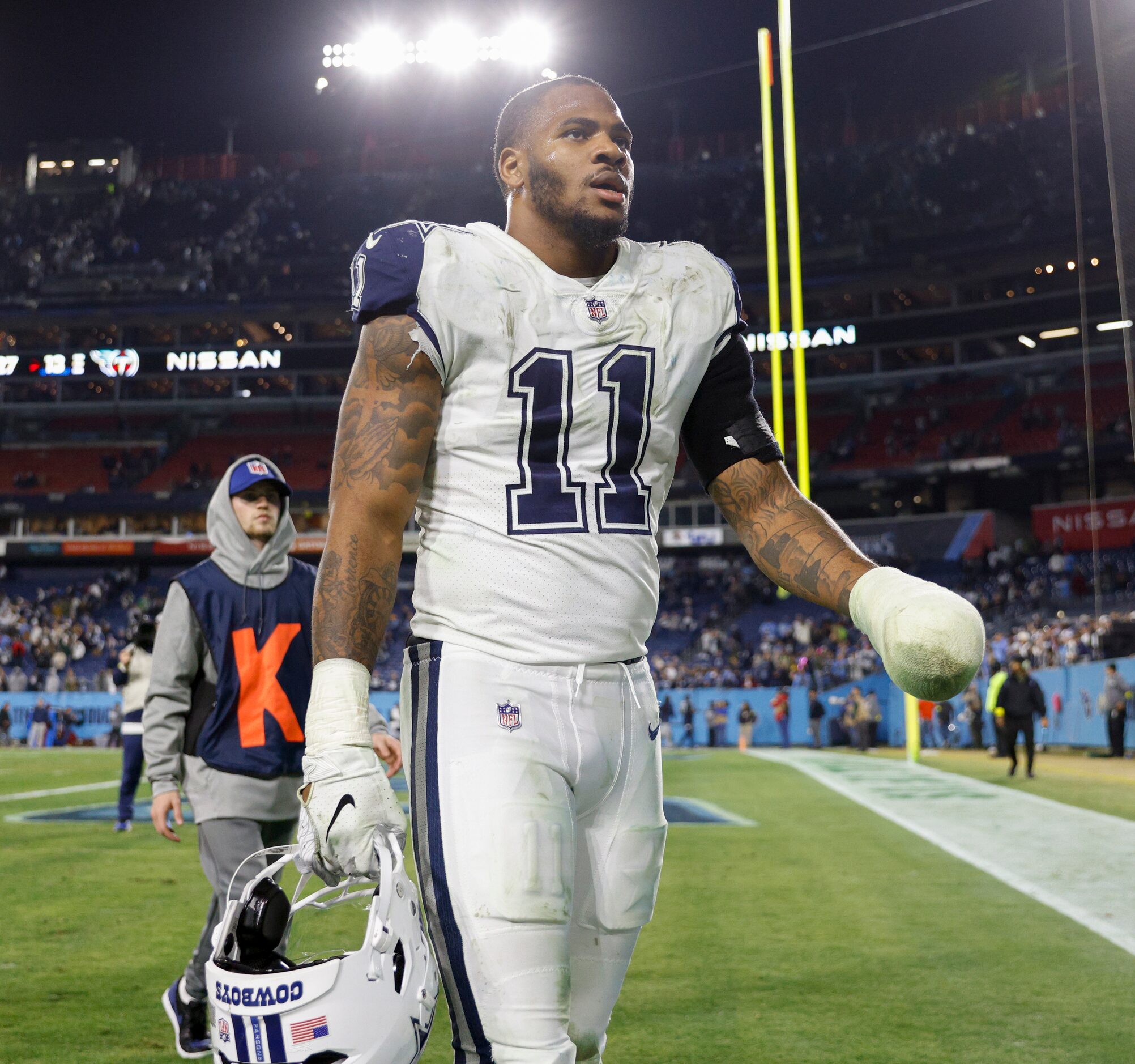 Dallas Cowboys linebacker Micah Parsons (11) walks off the field after an NFL game against...