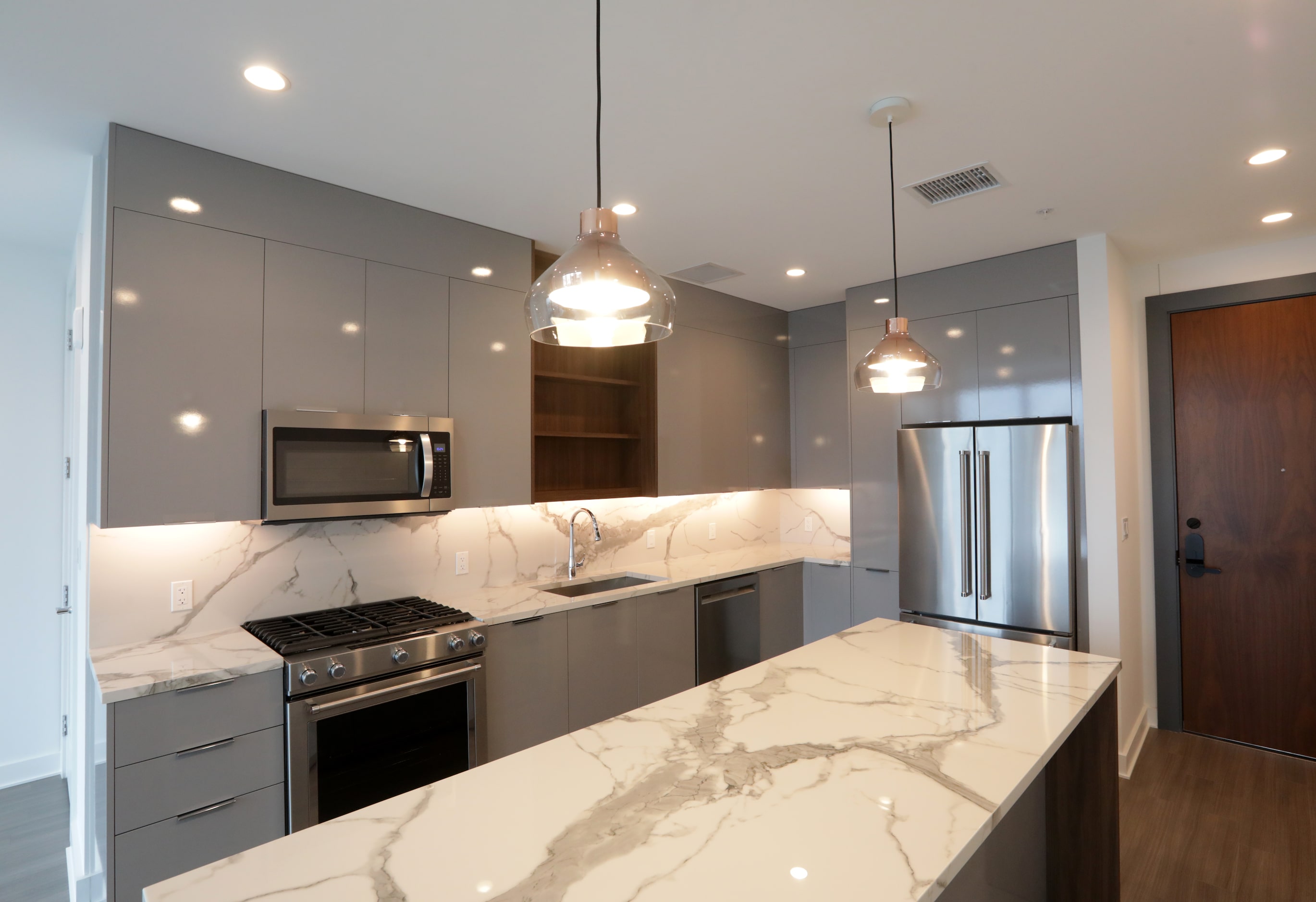 A finished kitchen area at Amli Fountain Place.