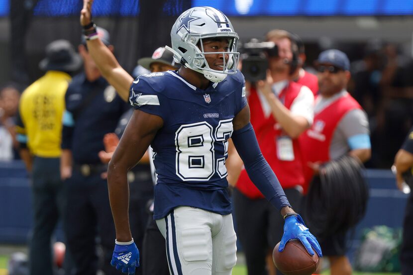 Dallas Cowboys wide receiver Jalen Brooks (83) reacts after completing a long pass play...