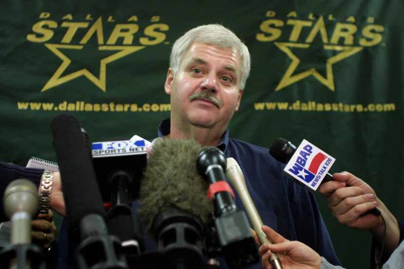 Dallas Stars head coach Ken Hitchcock answers questions during a press conference to discuss...