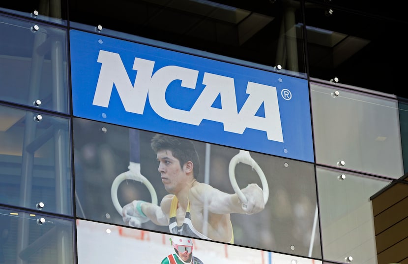 FILE - In this April 25, 2018, file photo, the NCAA headquarters is shown in Indianapolis....