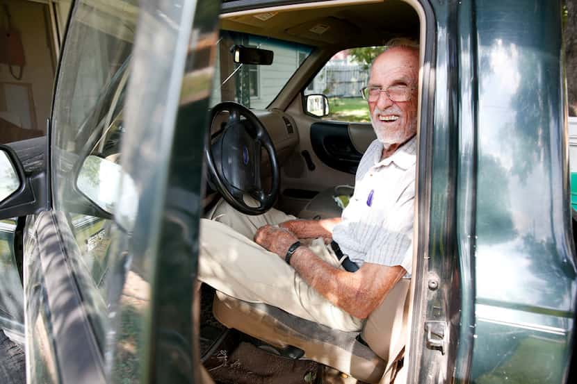 95-year-old Albert Bigler of Ennis sits in his truck in his driveway in Ennis, Texas,...