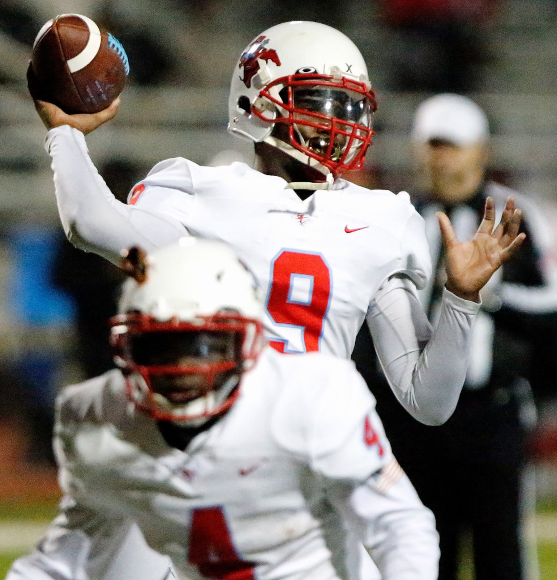 Skyline High School quarterback Darryl Richardson (9) throws a pass during the first half as...