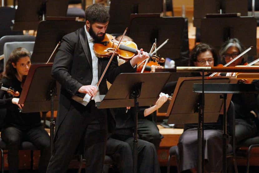 Dallas Symphony Orchestra co-concertmaster Nathan Olson doubles as soloist and conductor in...