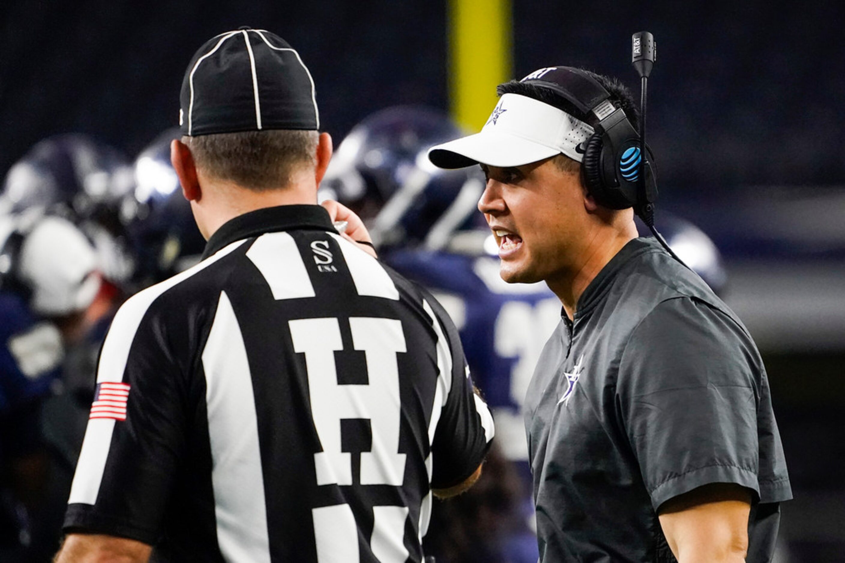 Frisco Lone Star head coach Jeff Rayburn talks with a referee during the first half of a...