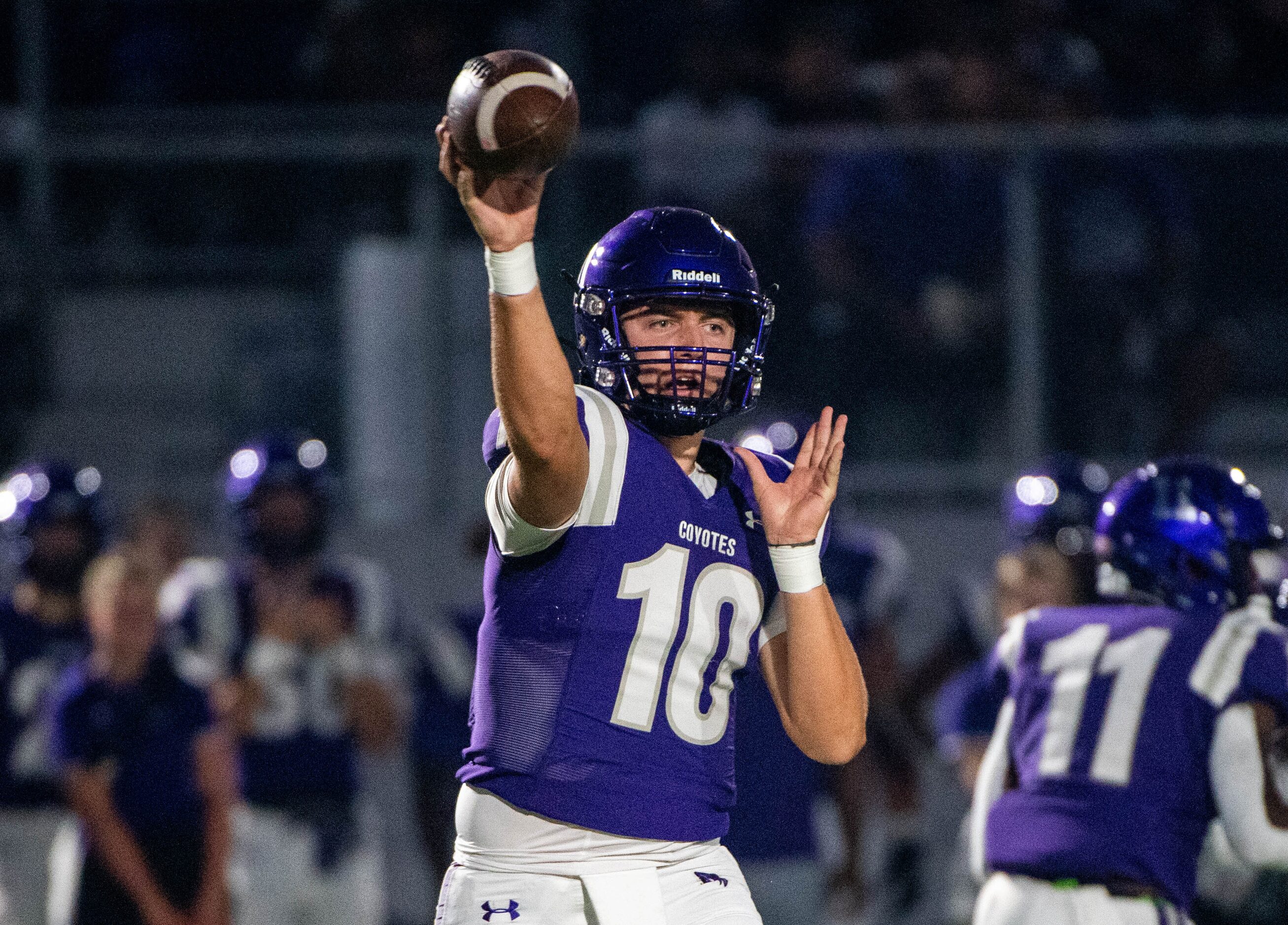 Anna quarterback Evan Bullock (10) passes in the first half during a high school football...