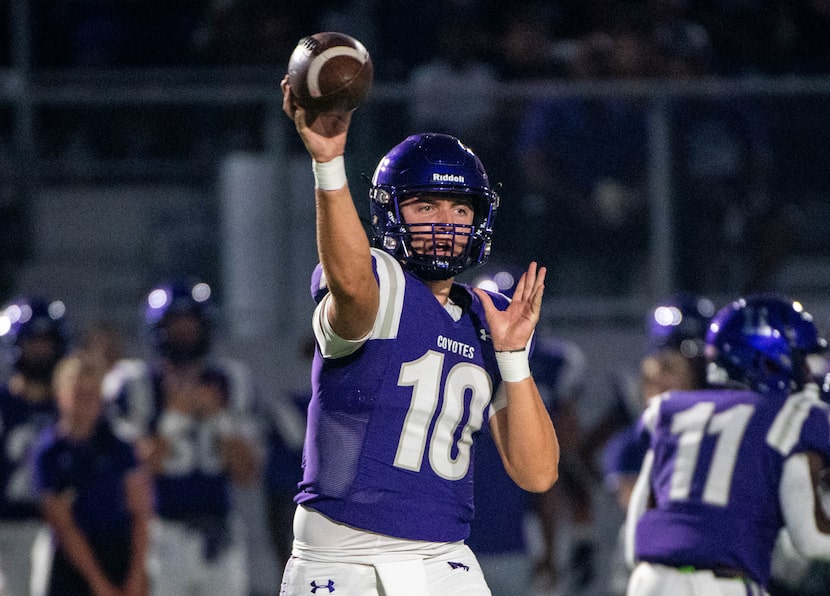 Anna quarterback Evan Bullock (10) passes in the first half during a high school football...