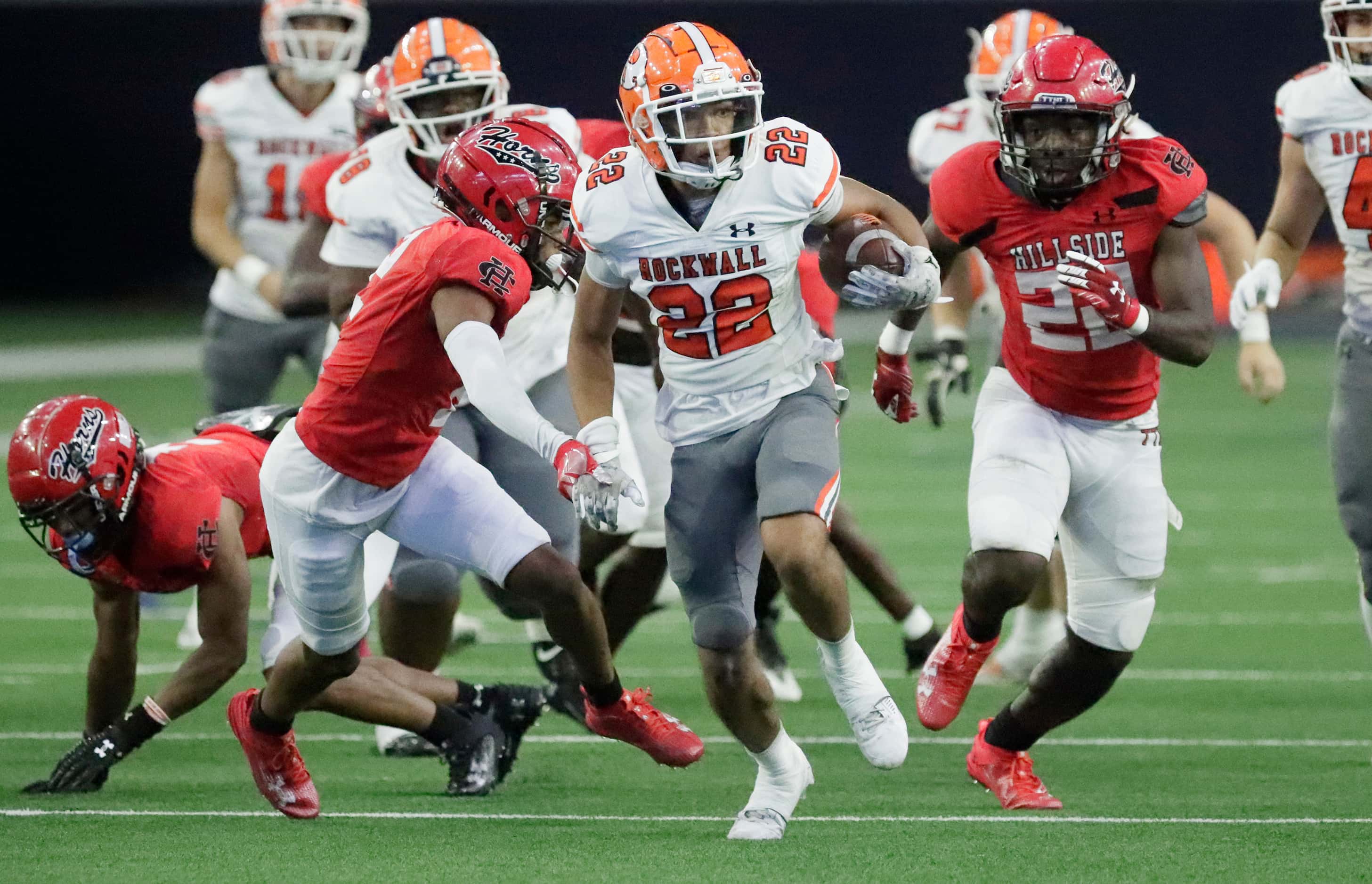 Rockwall High School running back Parker Williams (22) breaks free and goes on to score a...