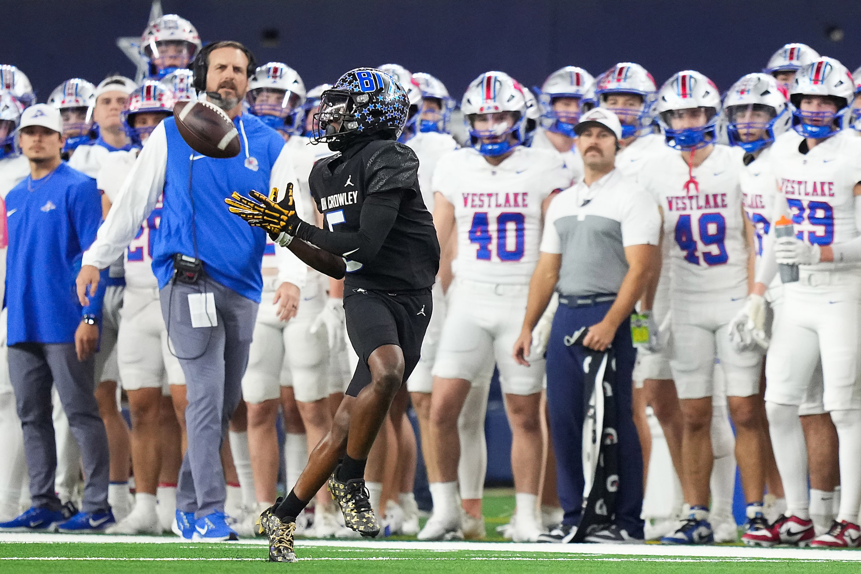 North Crowley wide receiver Quentin Gibson (6) hauls in a pass on a 75-yard touchdown...