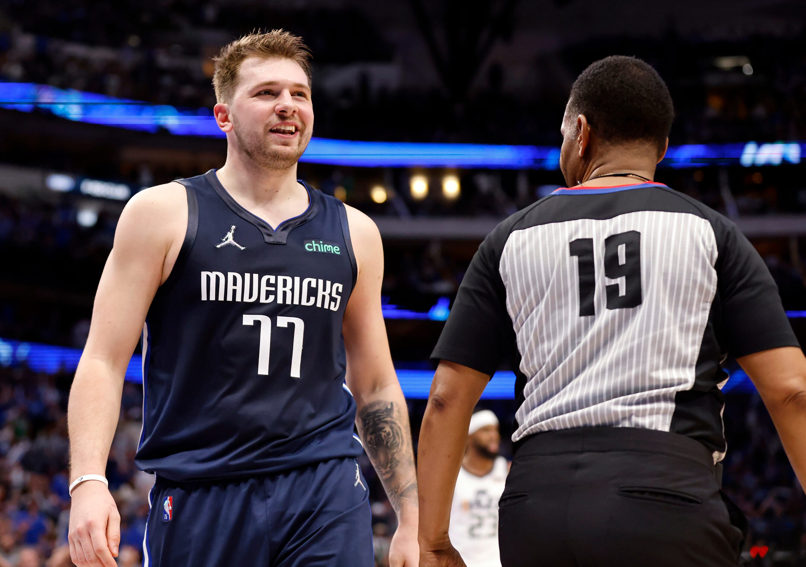 Dallas Mavericks guard Luka Doncic (77) reacts toward the Utah bench after being fouled by...