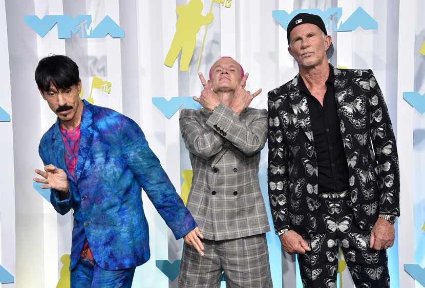 Anthony Kiedis, from left, Flea and Chad Smith, of Red Hot Chili Peppers arrive at the MTV...