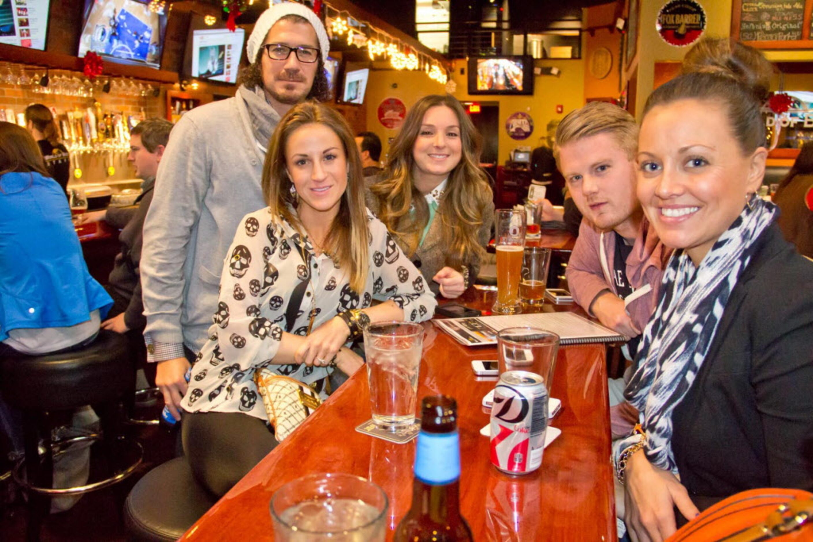 Jody Wade, Andrew Rossi, Leslie Ryan, Colin Walsh and Jenny Berger at World of Beer on Dec...