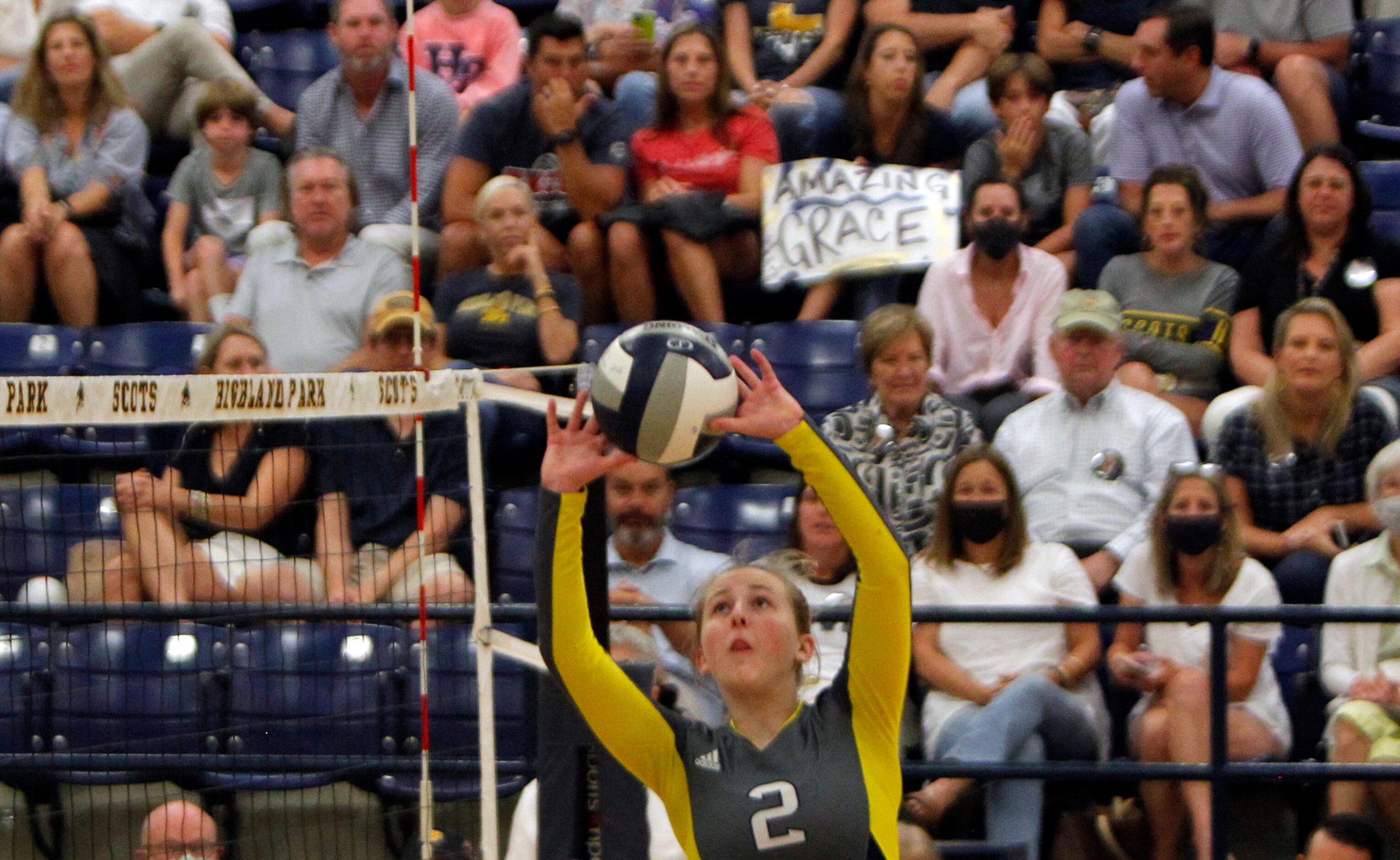 Highland Park setter Harper Hall (2) sets the ball for a teammate during the 3rd set of...