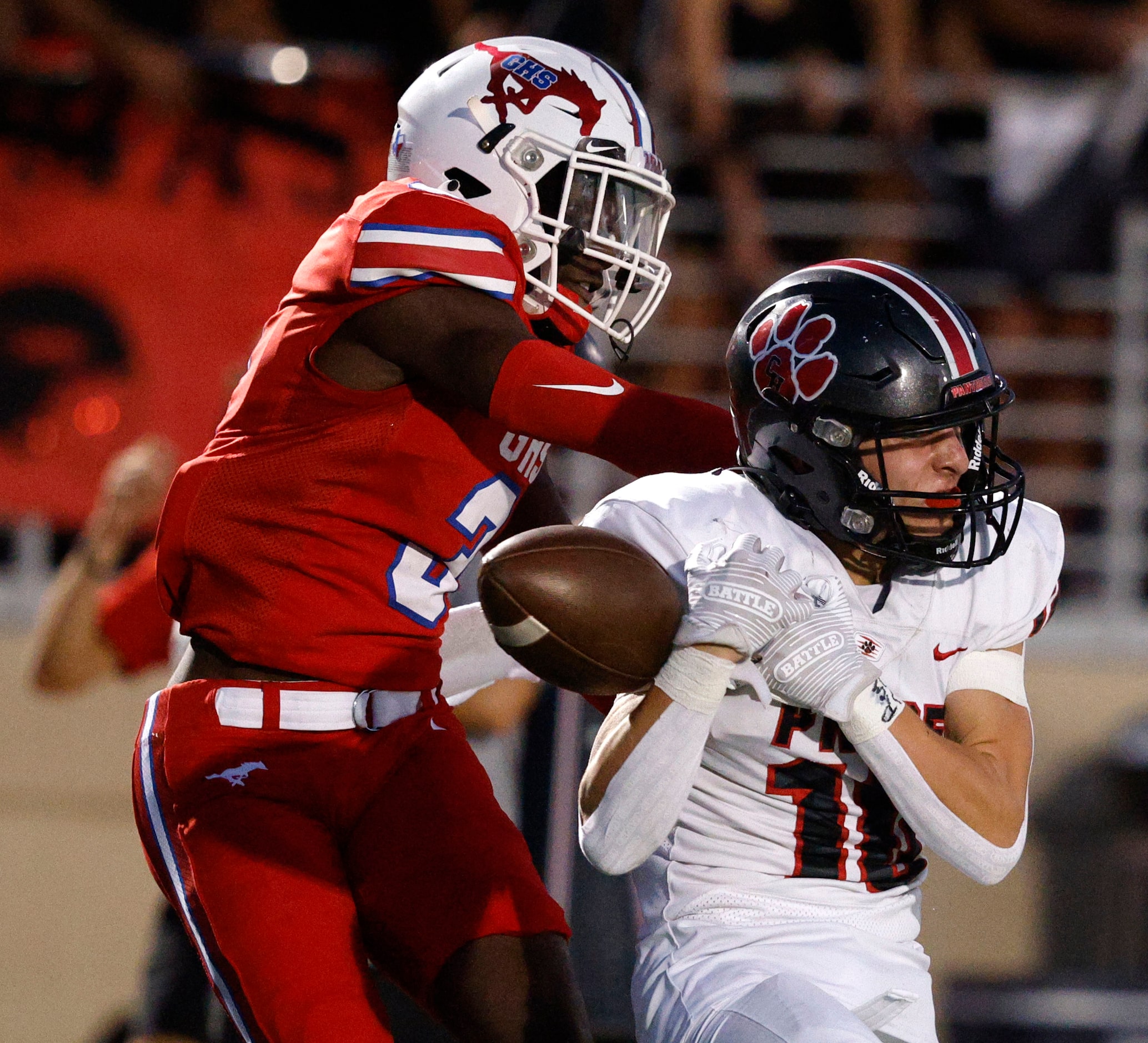 Colleyville Heritage's Kai Pruitt (10) fails to make the catch against Grapevine's Dereon...