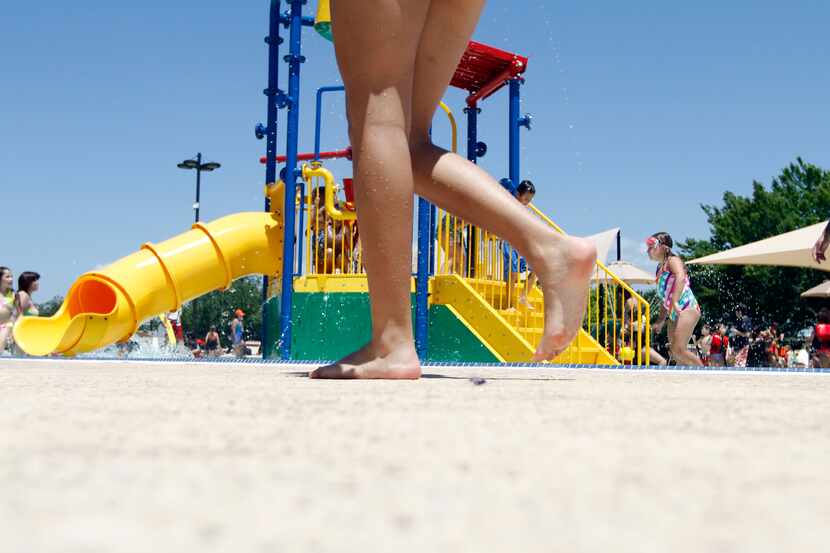 Parents and children alike enjoyed themselves at the West Irving Aquatic Center in 2010.