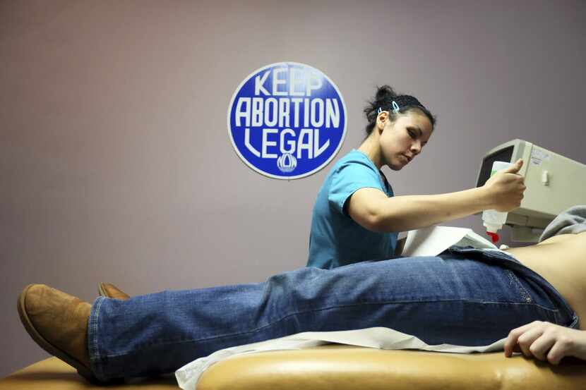 A file photo of Medical assistant Nyla Munoz beginning a sonogram exam at the Whole Woman's...