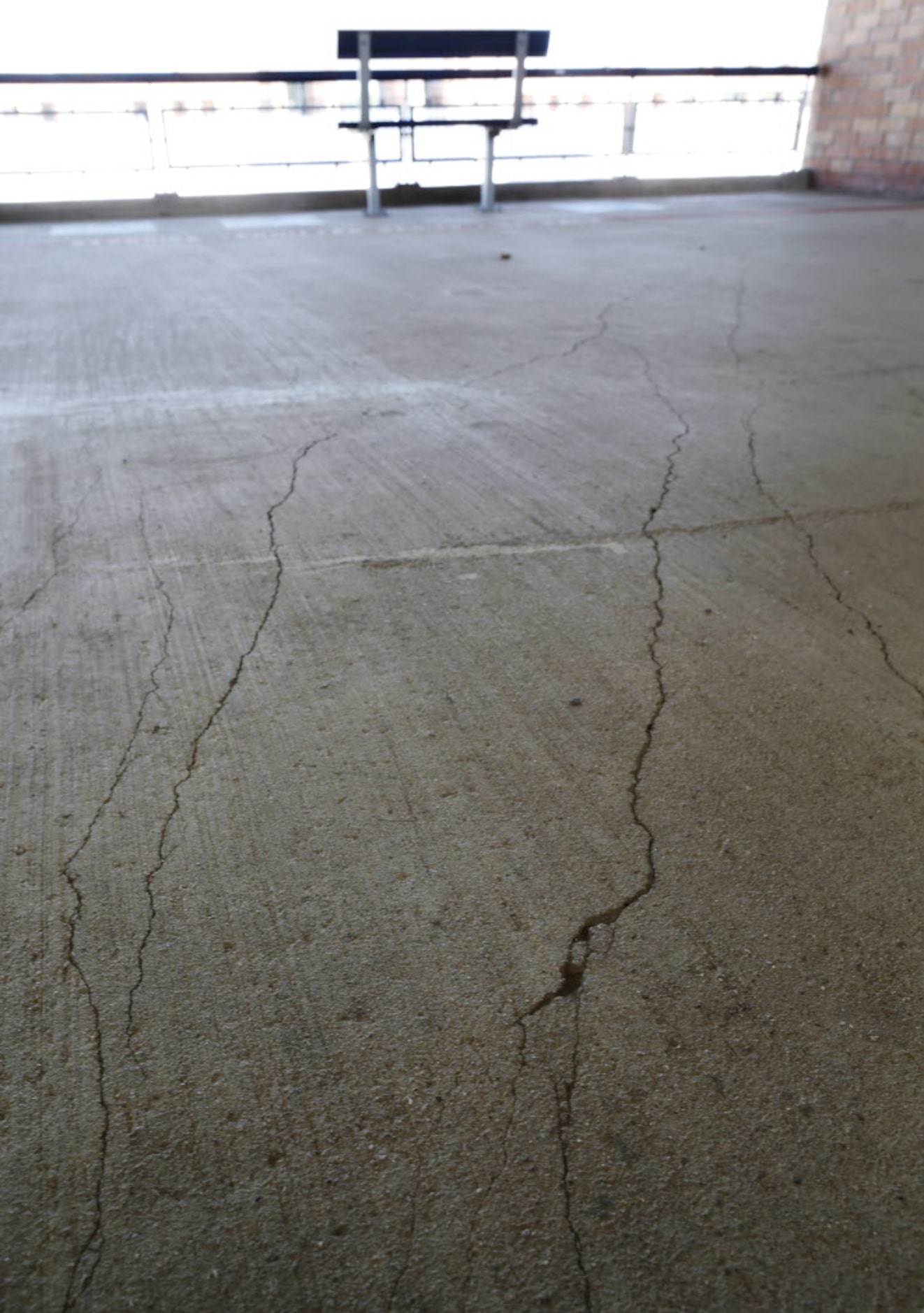 Some of the many cracks can be seen in this photo at Eagle Stadium in Allen, Texas on May...