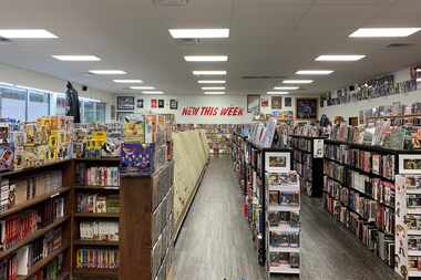 The shelves of Titan Comics at Forest Lane and Webb Chapel Road before it closed due to...