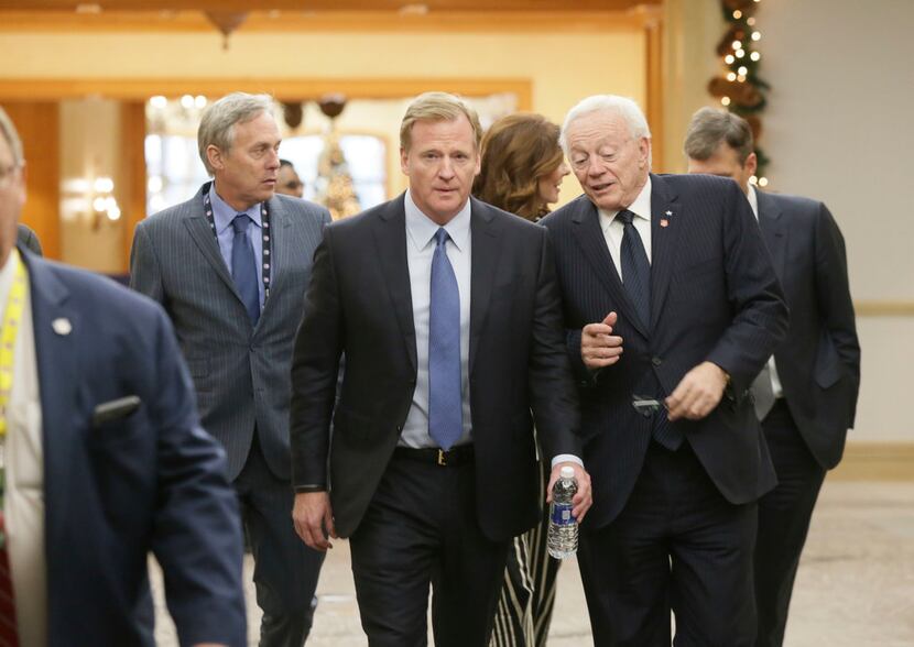 NLF Commissioner Roger Goodell, left, chats with Dallas Cowboys owner Jerry Jones during the...